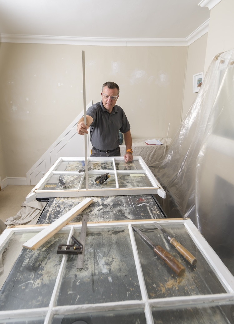 craftspeople at work at a period property